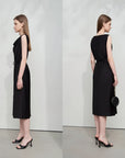 Black sleeveless dress shown from front and back on a model against a white background, with 'Amii' branding.