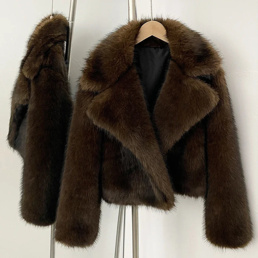 Brown fur coat on a mannequin against a white background