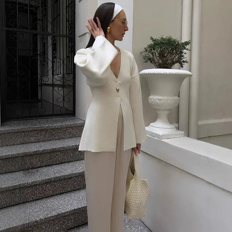 V-Neck, Buckle Closure, and Slit Detail - Loran