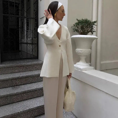 V-Neck, Buckle Closure, and Slit Detail - Loran