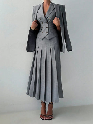 Gray suit with a skirt on a plain background