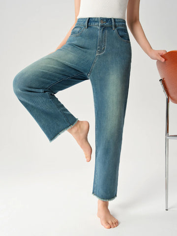 Person wearing blue jeans on a white background