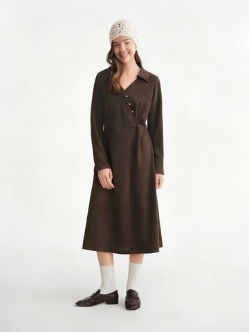 Woman wearing a brown dress with long sleeves on a white background, branded 'DUSHU'.