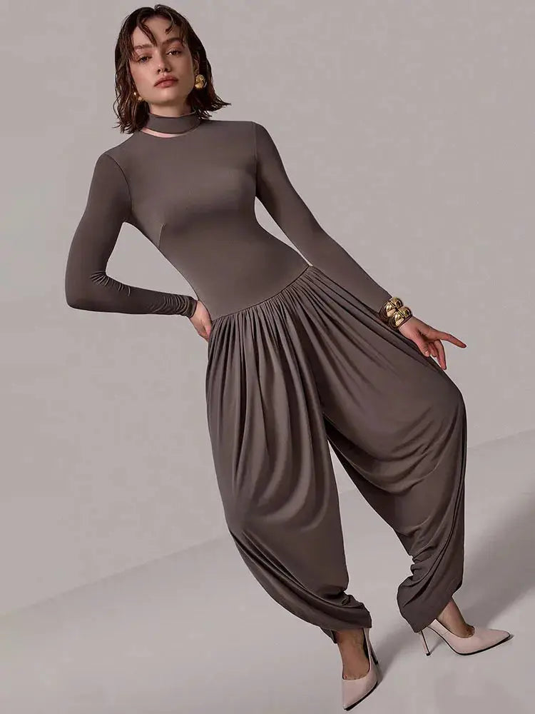 Slim-Fit Patchwork Jumpsuit with Draped Long Sleeves - Loran