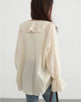 V-Neck Lace-Up Blouse with Ruffled Edges and Loose Fit