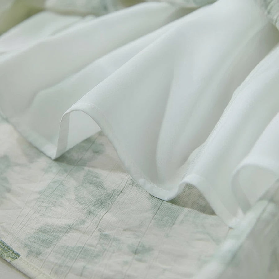 White fabric roll on a textured surface with 'Amii' branding.