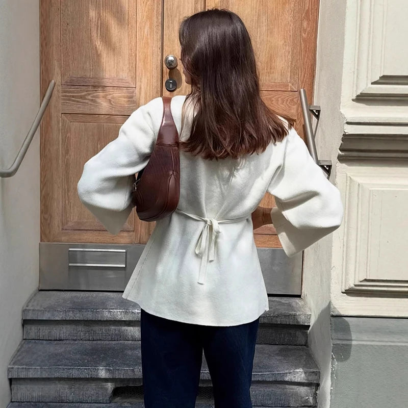 V-Neck, Buckle Closure, and Slit Detail