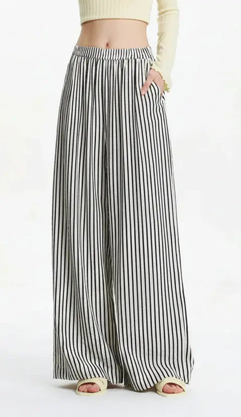 Black and white striped wide-leg pants on a white background