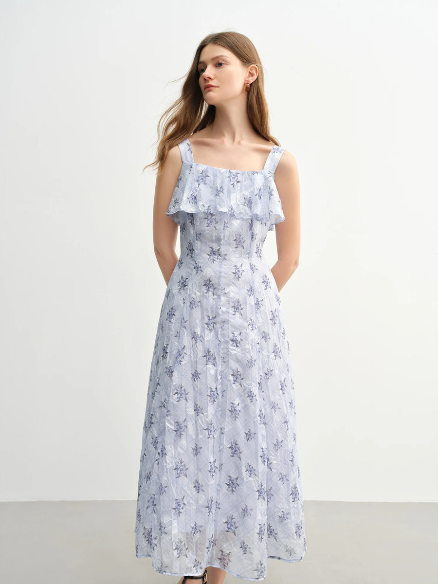 Woman wearing a floral dress on a white background