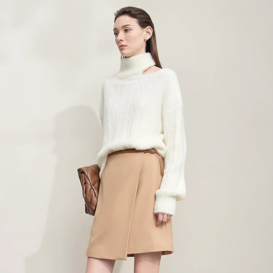 Woman wearing a white sweater and beige skirt with text about eco-friendly mink cashmere yarn and technical details.