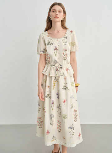 Woman wearing a floral dress on a plain background with 'DUShu' branding.