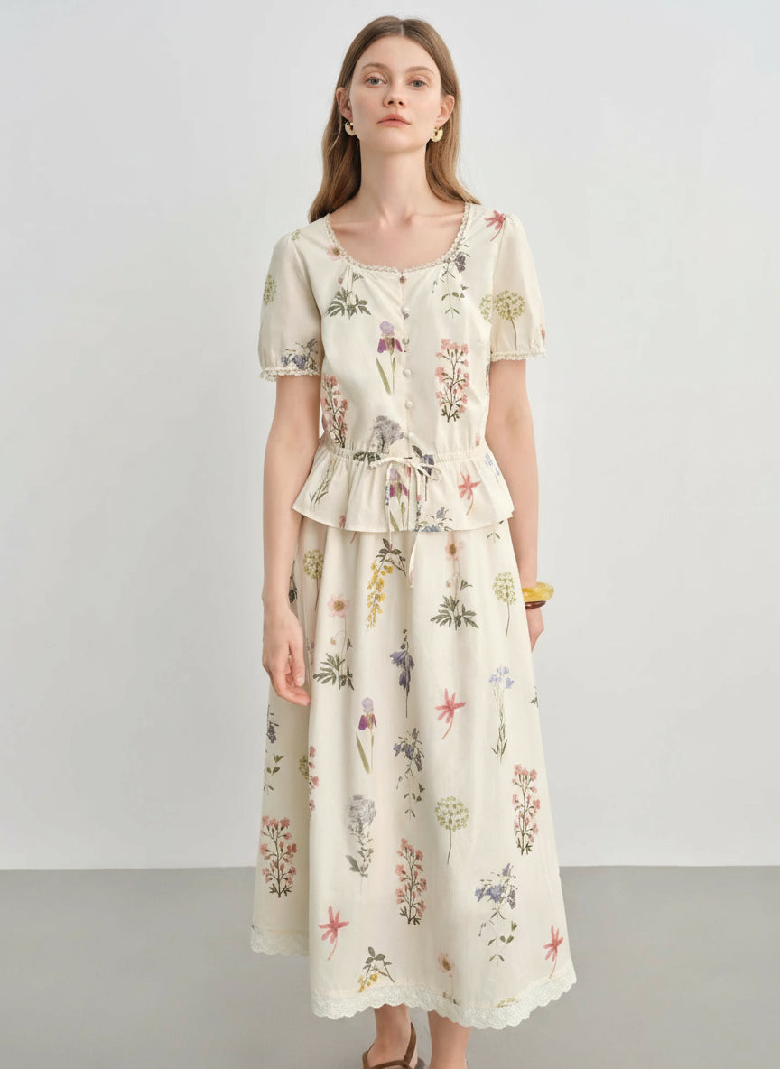 Woman wearing a floral dress on a plain background with 'DUShu' branding.