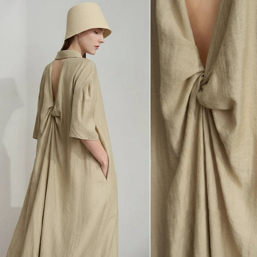 Beige dress with open back and short sleeves, featuring the brand 'Amii'.